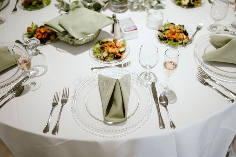 Elegant White Table Setting for a Wedding Reception with Pristine