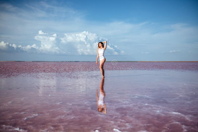 Elegant woman dancing on water. stock image Elegant woman dancing on water. stock image
