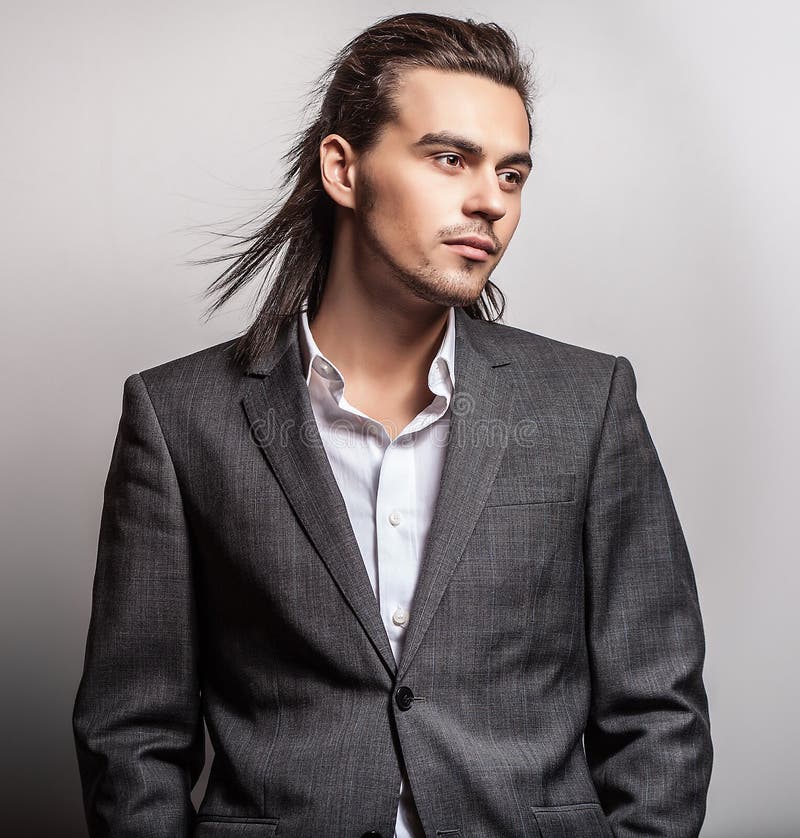 Elegant Young Handsome Long-haired Man in Costume. Stock Image - Image ...