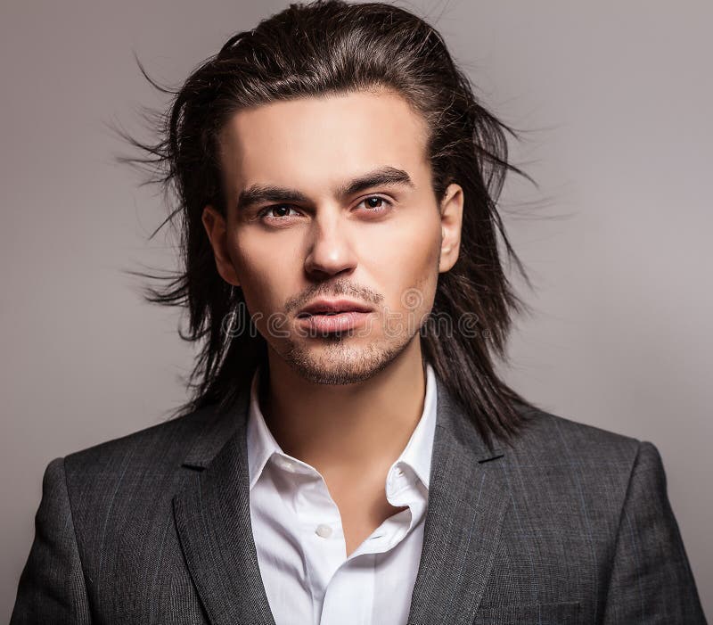 Elegant Young Handsome Long-haired Man in Costume. Stock Image - Image ...