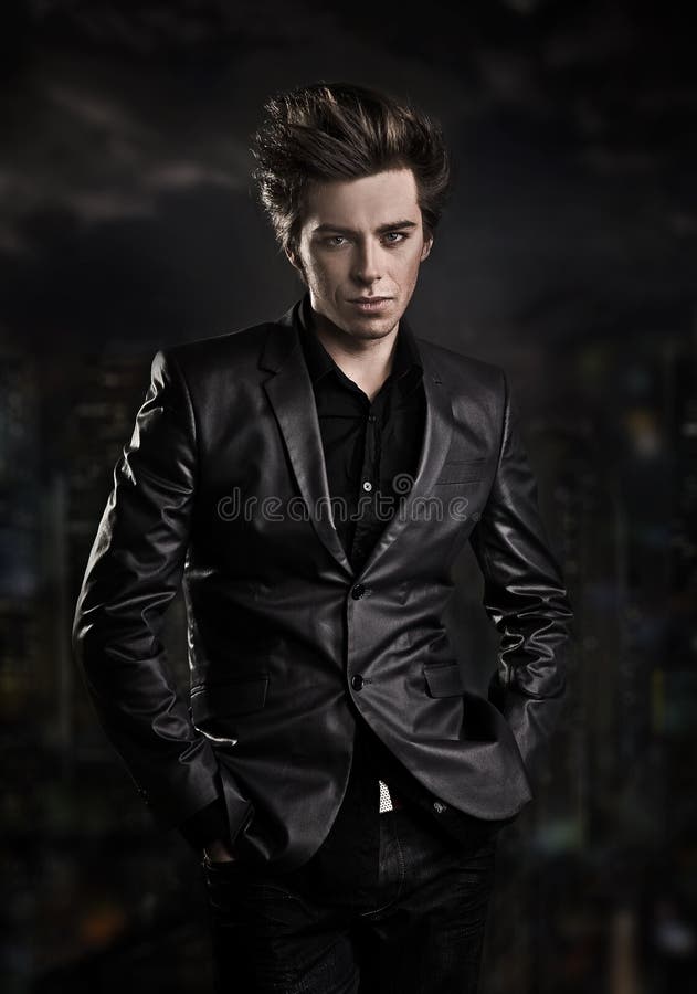 Elegant young handsome man stock images