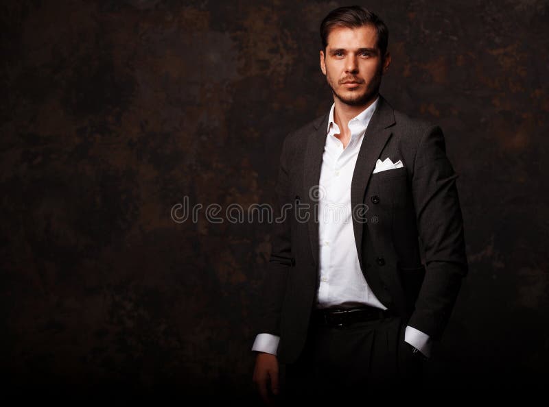 Elegant young handsome man. Studio fashion portrait