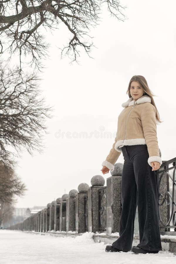 Elegant Young Woman in Trendy Beige Sheepskin Coat in Winter Park.  Fashionable Womens Clothing for Cold Winter Stock Image - Image of jeans,  outdoors: 265097541