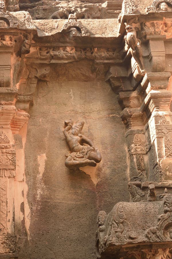 Elegantly sculptured dancing girl at Ellora Caves stock photo Elegantly sculptured dancing girl at Ellora Caves stock photo