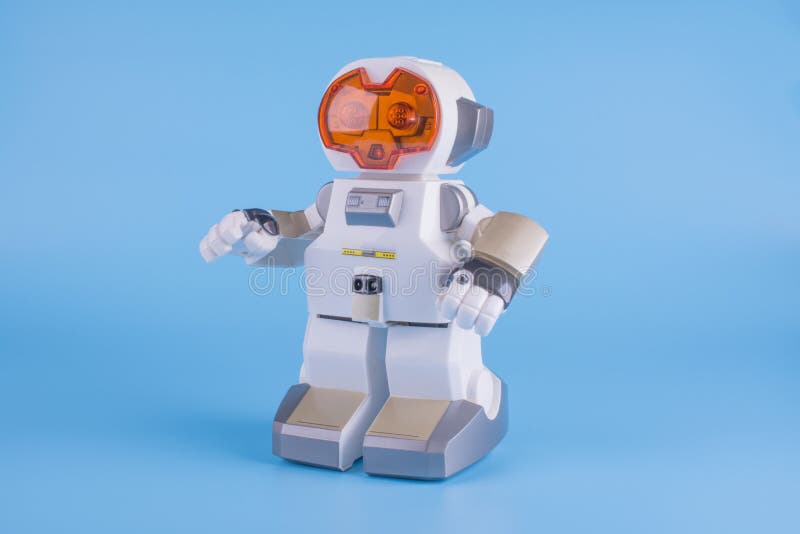 Elektronisk leksaksrobot vit med orange ögon royaltyfria foton