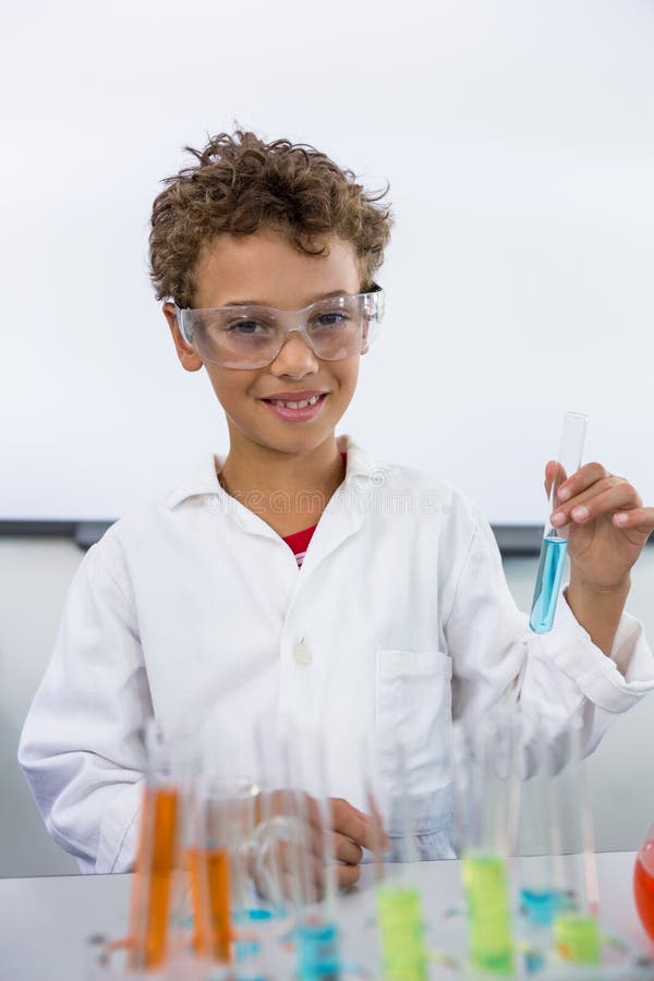 Boy Holding Flask with Liquid at Laboratory in School Stock Image ...