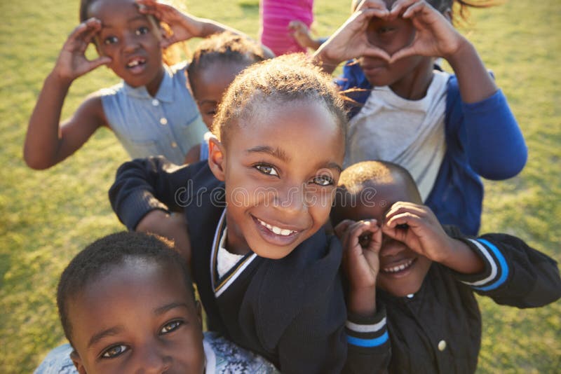 Elementary school kids having fun outdoors, high angle stock image