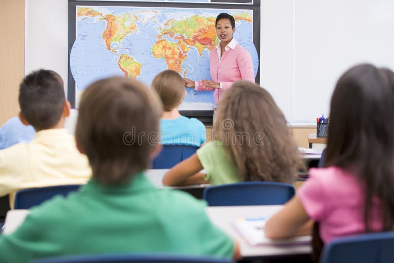 Elementary school teacher in geography class