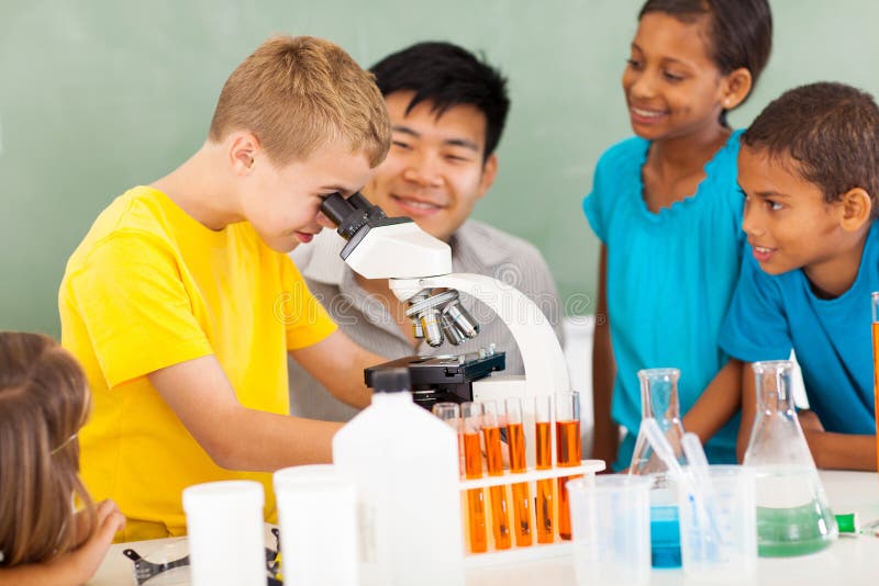 Group of students in elementary science class with teacher