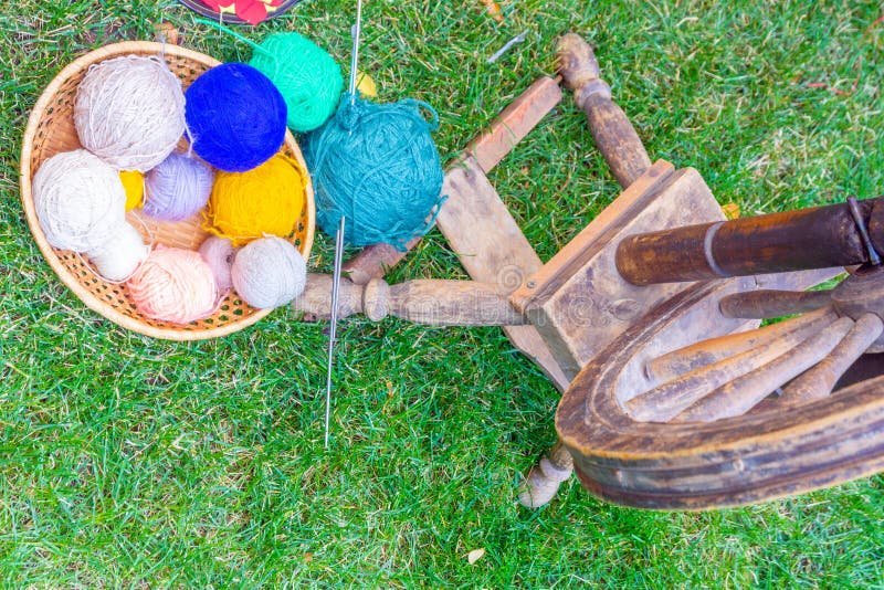 Spinning wheel with clews stock photo. Image of green 156994136