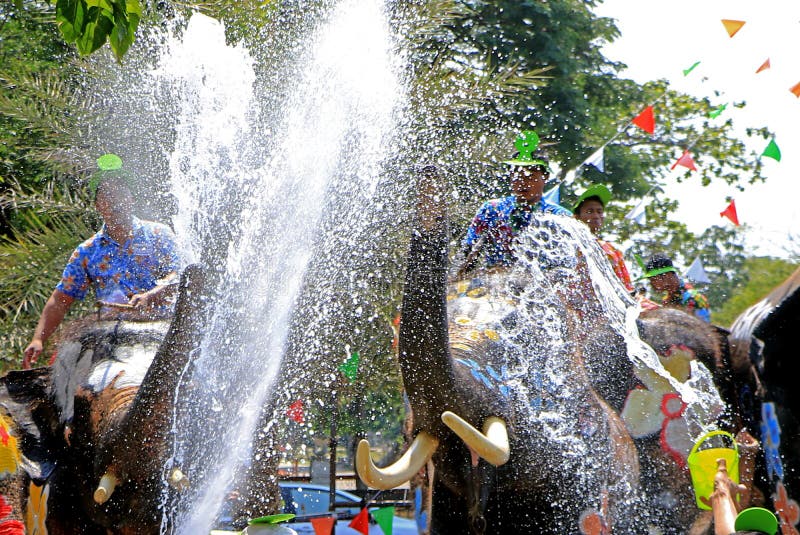 Elephants Play Water Battle with Children during Songkran Editorial ...
