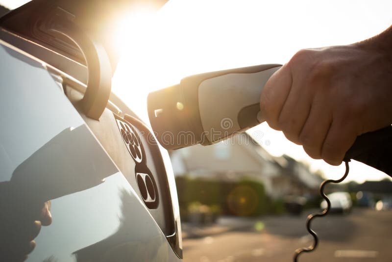 Eletric car charging photo closeup