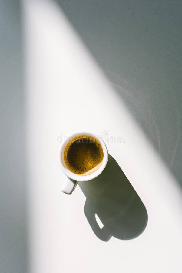 elevated view of cup of tasty coffee in white cup stock image