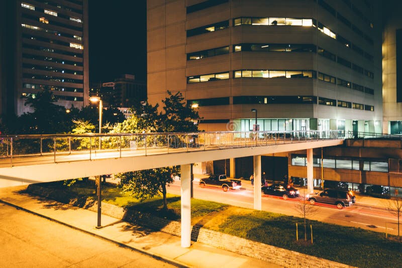 Elevated walkway over Charles Street at night in Baltimore, Mary