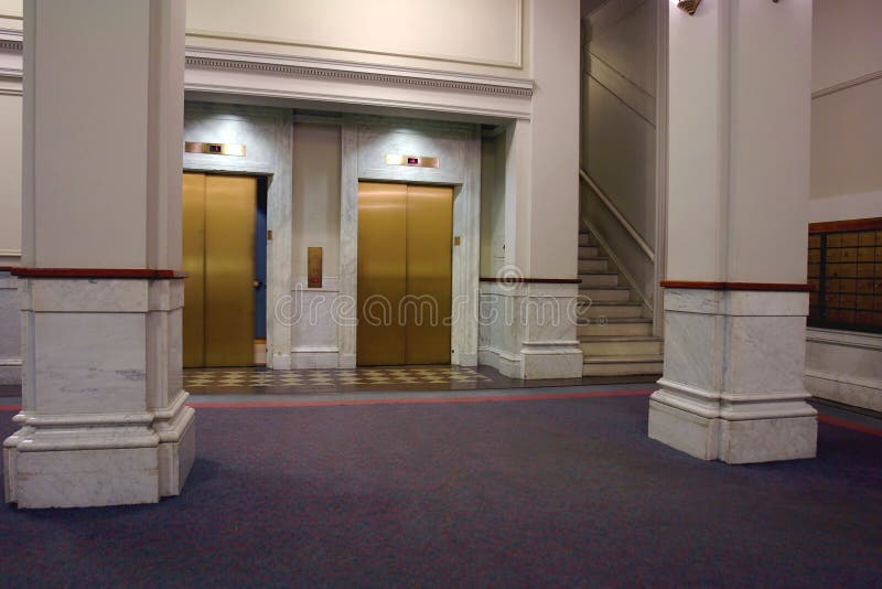 Elevators in Lobby with Door Closing Stock Image Image of lobby