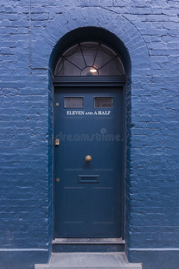 Eleven and a half, Door on Fournier Street near Spitalfields market, London, Englandâ€¨â€¨