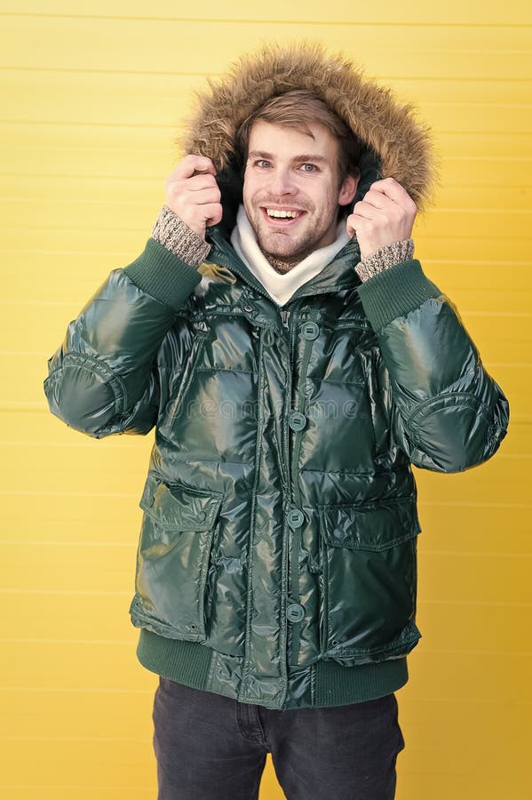 Eliminating Cold Spots. Handsome Man Wearing Faux Fur Hood. Casual ...