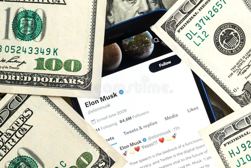 Elon Musk Twitter account and money background. Business and stock concept photo