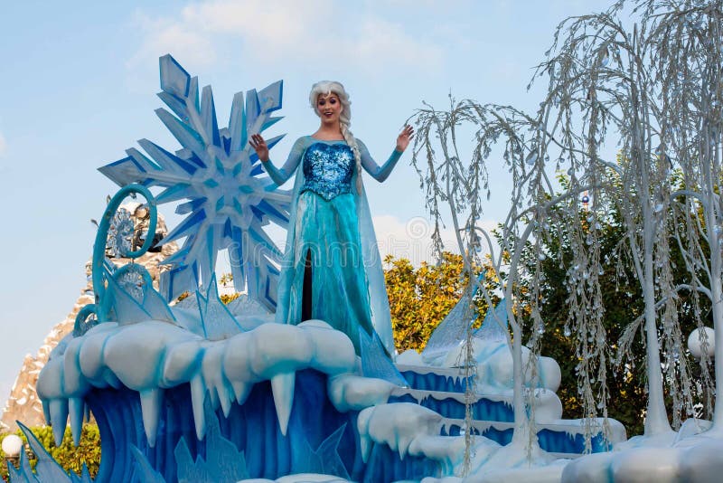 Elsa from the popular computer-animated musical fantasy-comedy is waving atop a beautiful blue and white snowy float in Disneyland's A Christmas Fantasy Parade. Very popular Christmastime parade at Disneyland. Elsa from the popular computer-animated musical fantasy-comedy is waving atop a beautiful blue and white snowy float in Disneyland's A Christmas Fantasy Parade. Very popular Christmastime parade at Disneyland.