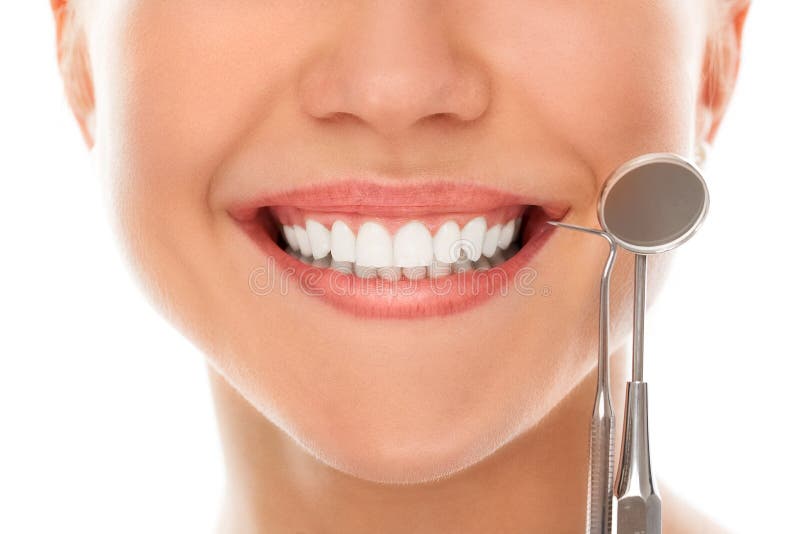 Em um dentista com um sorriso fotos de stock Em um dentista com um sorriso fotos de stock