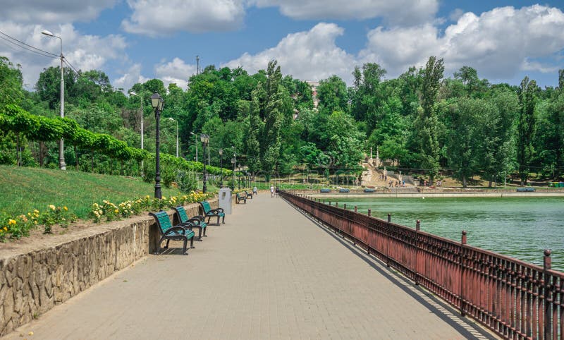 Embankment of Valea Morilor Lake in Chisinau, Moldova, on a sunny summer day. Embankment of Valea Morilor Lake in Chisinau, Moldova, on a sunny summer day