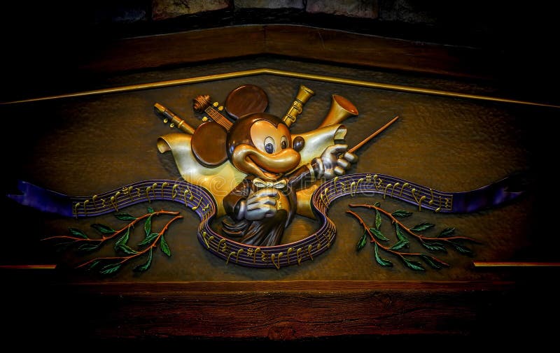 Embleem van mickeymuis in de uitrusting van de overlegleider royalty-vrije stock foto's Embleem van mickeymuis in de uitrusting van de overlegleider royalty-vrije stock foto's