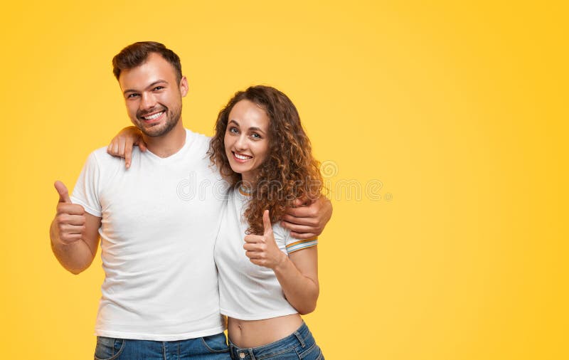 Young Couple Gossiping On Yellow Background Stock Image Image Of