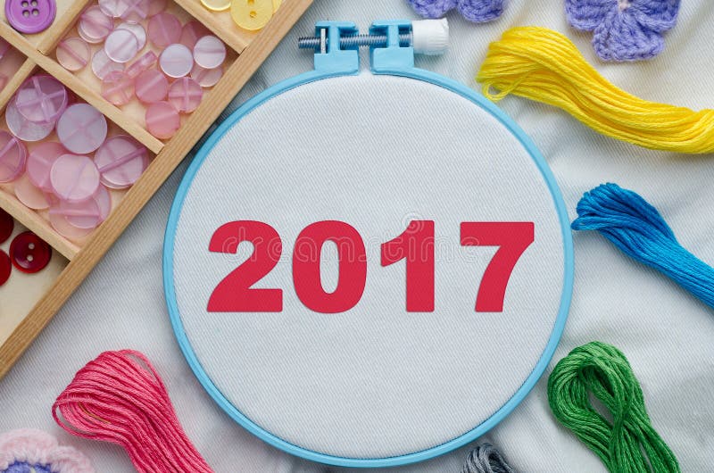 Embroidery Hoop with Blank Fabric, Colored Sewing Threads Stock Photo