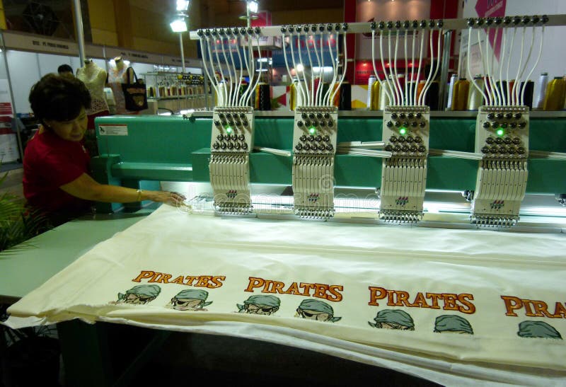 Embroidery machine editorial stock image. Image of expo 68432074