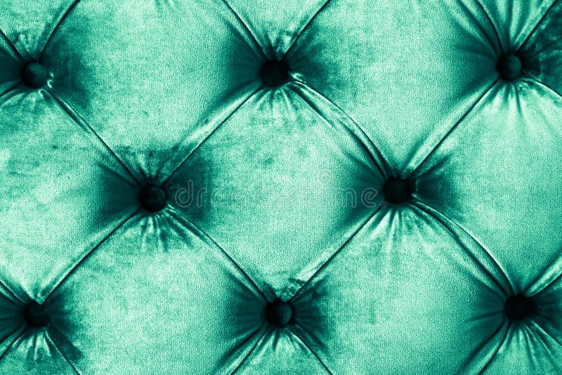 Emerald luxury velour quilted sofa upholstery with buttons, elegant green home decor texture and background royalty free stock images Emerald luxury velour quilted sofa upholstery with buttons, elegant green home decor texture and background royalty free stock images