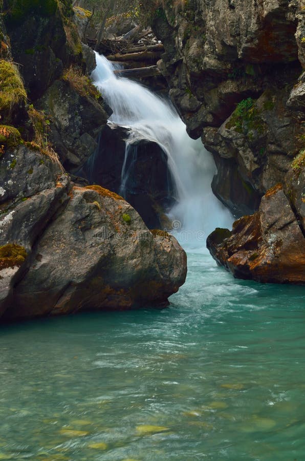 Emerald waterfall stock photo. Image of rock, scene, leisure 34055554