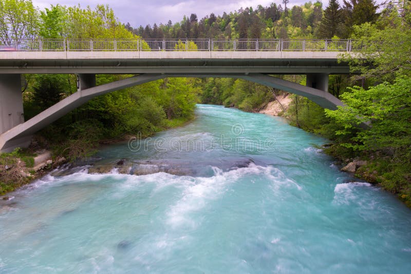 The emerald waters of Sava river in Bled, Slovenia, popular for fishing, rafting, kayaking or canoeing stock photo The emerald waters of Sava river in Bled, Slovenia, popular for fishing, rafting, kayaking or canoeing stock photo