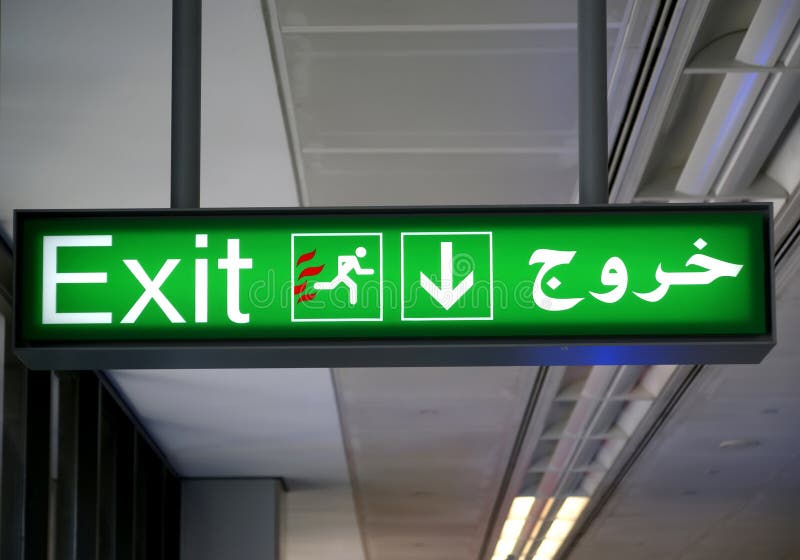 Emergency Exit Sign In English And Arabic Languages Stock Image - Image