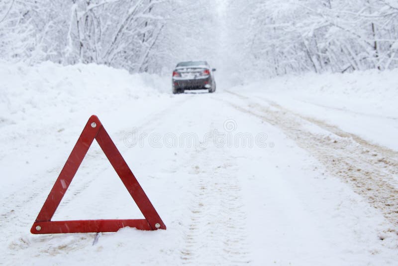 Emergency Stop Car on Winter Road in the Countryside Stock Photo