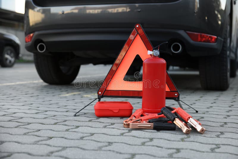 Emergency Warning Triangle and Safety Equipment Near Car, Space for