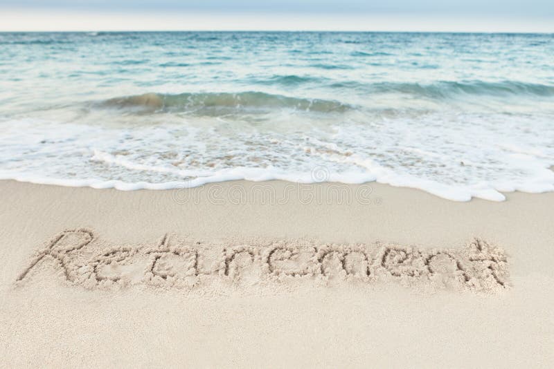 Retirement written on sand by sea at beach. Retirement written on sand by sea at beach