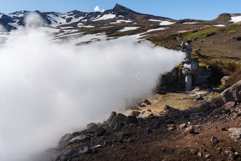 Emission of thermal steam-water mixture from well in geothermal deposit area royalty free stock photos Emission of thermal steam-water mixture from well in geothermal deposit area royalty free stock photos