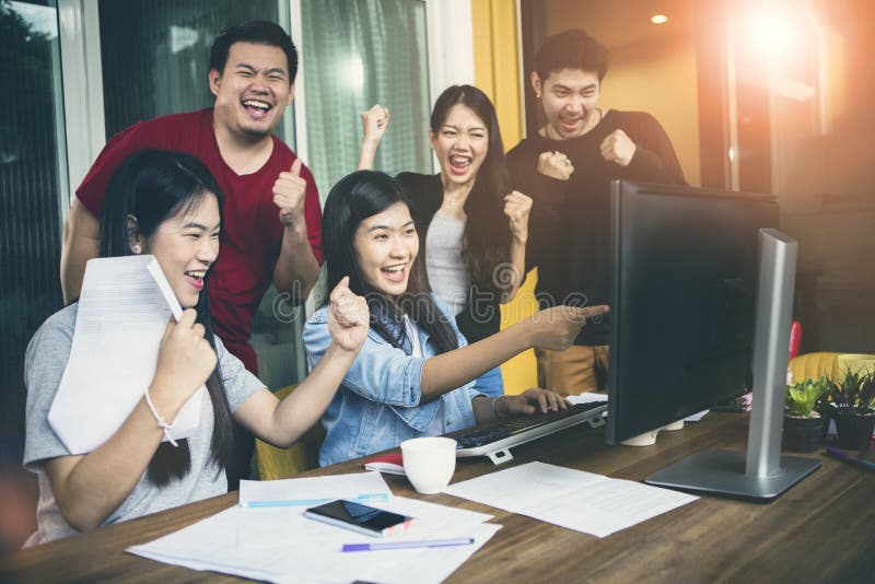 Asian younger freelance teamwork   job successfull happiness emotion. Asian younger freelance teamwork   job successfull happiness emotion