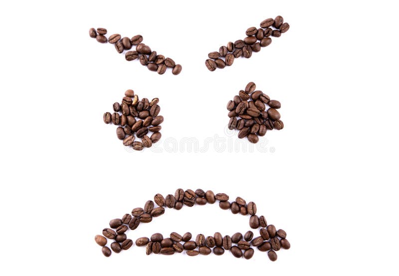 Emoticon Face Made of Coffee Beans on White Backgroud with Copyspace