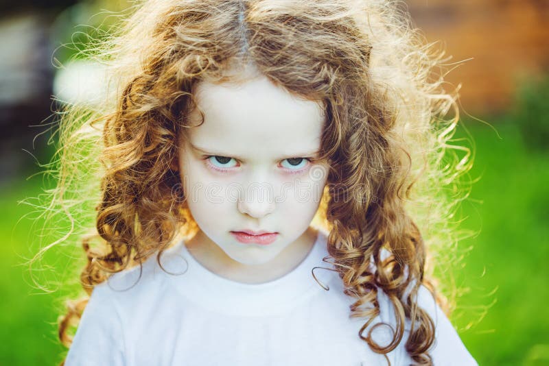 Emotional Child With Angry Expression On Face. Stock Photo Image