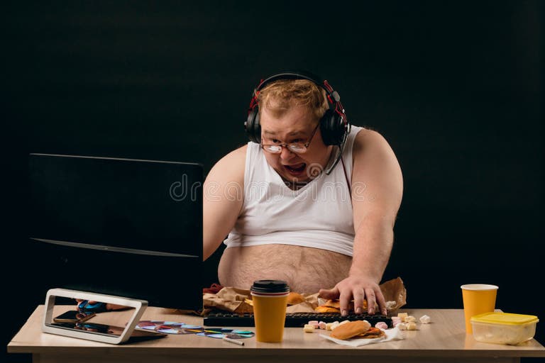 emotional-fat-plump-man-listening-to-music-using-computer-close-up-photo-funny-wasting-his-time-194453147.jpg