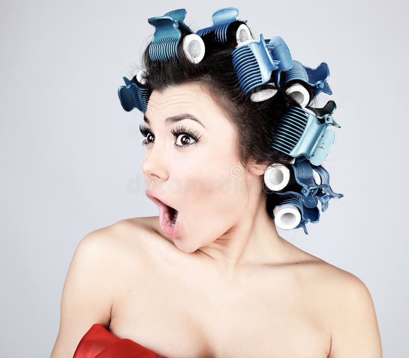 Emotional Girl with hair-curlers on her head