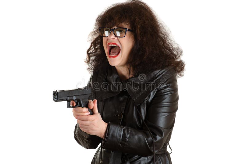 Emotional mature adult woman with a gun in hand royalty free stock photo Emotional mature adult woman with a gun in hand royalty free stock photo