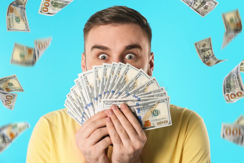 Emotional young man with money stock photos Emotional young man with money stock photos