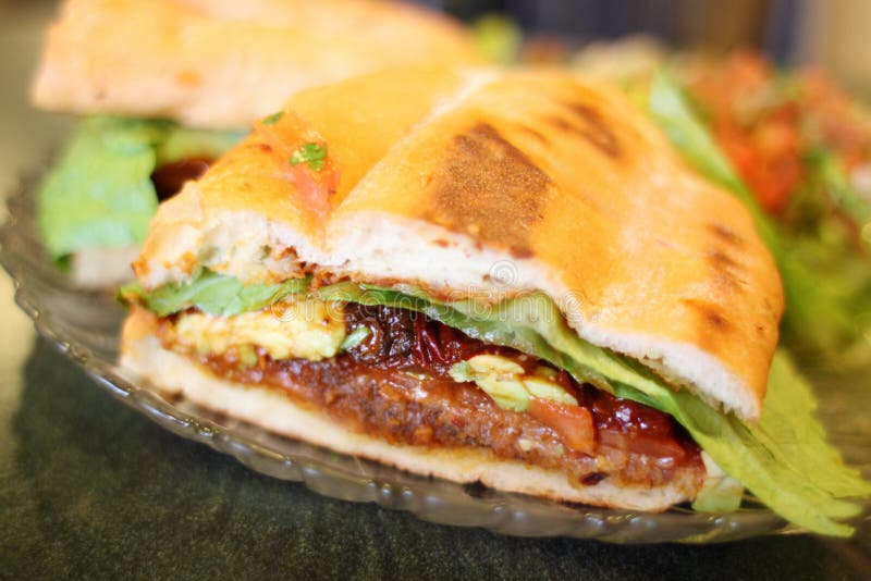 Emparedado milanés o mexicano de Torta del estilo foto de archivo Emparedado milanés o mexicano de Torta del estilo foto de archivo