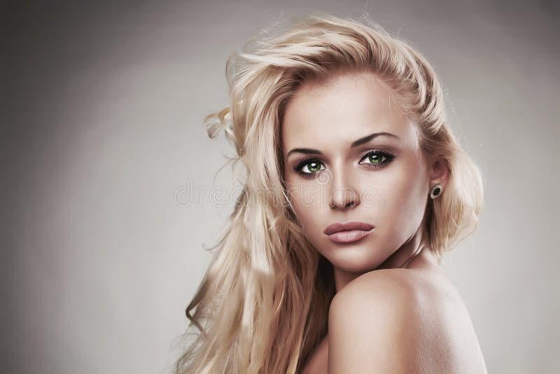Portrait of Sensitive Beautiful blond woman.hairstyle.salon care.sexy young girl. close-up portrait. green eyes. Portrait of Sensitive Beautiful blond woman.hairstyle.salon care.sexy young girl. close-up portrait. green eyes