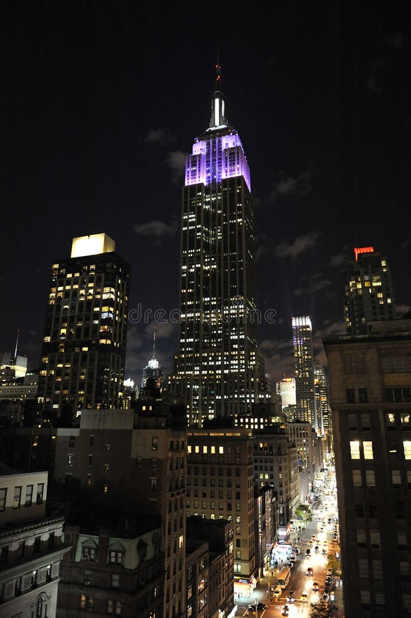Empire State Building and Fifth Avenue at night stock image