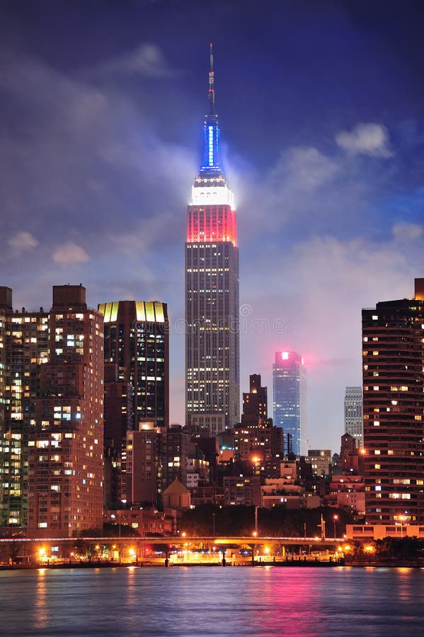 Empire State Building At Night Editorial Photography - Image of blue