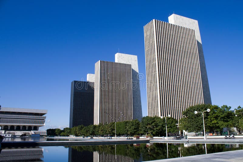 New York state agency office building towers and the legislative office building on the left in Albany, NY, part of the Empire State Plaza. New York state agency office building towers and the legislative office building on the left in Albany, NY, part of the Empire State Plaza.