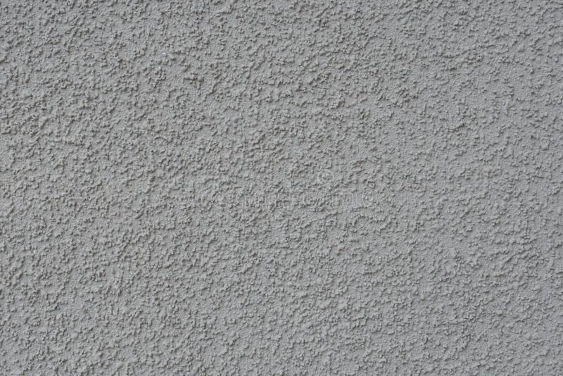 Emplastro Textured de uma cor cinzenta fotografia de stock